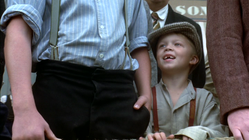 Before conditioning sets in, a little boy enthusiastically enjoys the parade